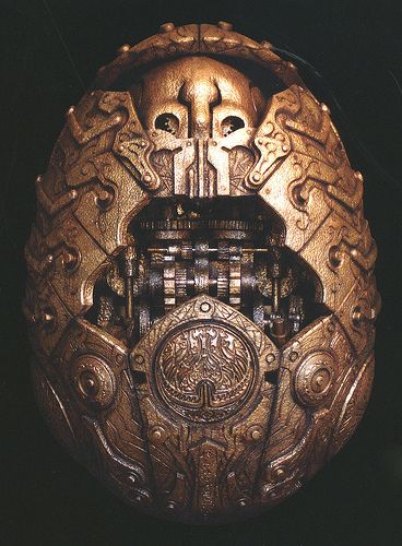 Golden Army Egg Hellboy Golden Army, Darkhorse Comics, Art Nouveau House, Golden Army, Jason And The Argonauts, Alien Artifacts, Steampunk Gadgets, Maya Art, Ghost In The Machine