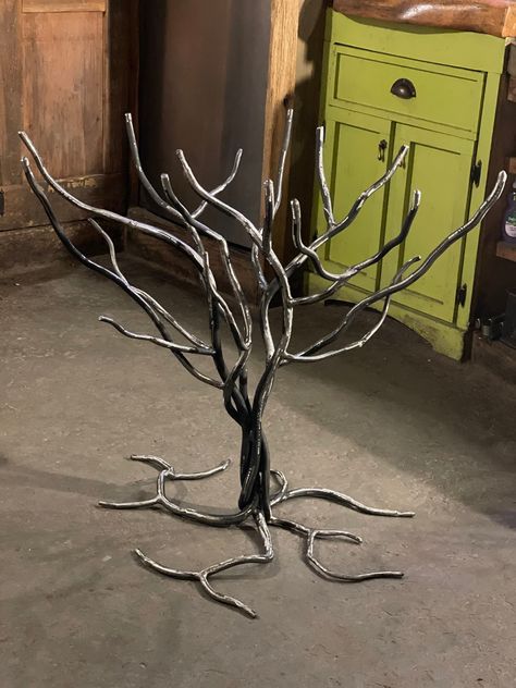 "Hand forged iron Tree of Life table base for wooden or stone top. Beautiful rustic modern art piece as a unique organic home accent. Size shown is 36\" x 32\" x 28\" and shown in Organic Steel finish. Can be finished in Organic Steel, Oil Rubbed Bronze or Blackened Steel. Contact before ordering to discuss the top being used. * This item is currently available in stock." Metal Rod Art, Metal Tree Sculpture Ideas, Welded Tree, Rebar Tree, Metal Wire Tree, Metal Trees, Steel Tree Sculpture, Metal Tree Sculpture Branches, Metal Tree Sculpture