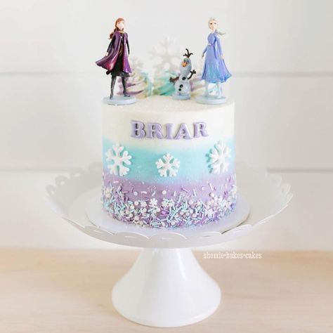 NY CAKE on Instagram: “Frozen Themed Birthday Cake by @sherrie.bakes.cakes • Frozen themed cake for Little Miss Briar as she celebrates turning 2! 💜❄️💙☃️. . This…” Easy Frozen Birthday Cake, Disney Frozen Cake Ideas, Disney Themed Birthday Cakes, Frozen Smash Cake, Ice Cream Cake Frozen Theme, Elsa Themed Birthday Cake, Simple Frozen Cake, Frozen 2nd Birthday Cake, Frozen Inspired Cake