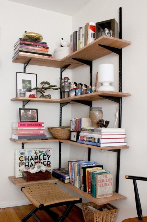 12 Decorating Ideas for Tricky Room Corners Track Shelving Living Room, Boaxel Ikea Living Room, Bauhaus Home Office, Home Office Shelves Above Desk, Boaxel Ikea Ideas Living Room, Bookshelves Over Desk, Boaxel Bookshelves, Boaxel Ikea Ideas Office, Boaxel Office