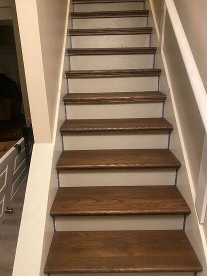 Many years ago, I created a post where I took the carpet off my stairs and updated them with Retro treads or stair caps. This has been my most popular post to date at over 2 million views. I’ve always wanted to do this project again and never had the opportunity until now. We are getting ready to put our house up for sale and the basement stairs were atrocious. If you want to see my first post, you can find it here... https://www.hometalk.com/3549194/from-carpet-to-wood-stairs-redo-c… Stair Redo Ideas Removing Carpet, Replace Carpet On Stairs With Wood, Stair Remodel Diy Removing Carpet, How To Install Stair Treads And Risers, Staircase Remodel Diy, Refinish Stairs Removing Carpet, Redo Stairs, Basement Decoration, Vinyl Stairs