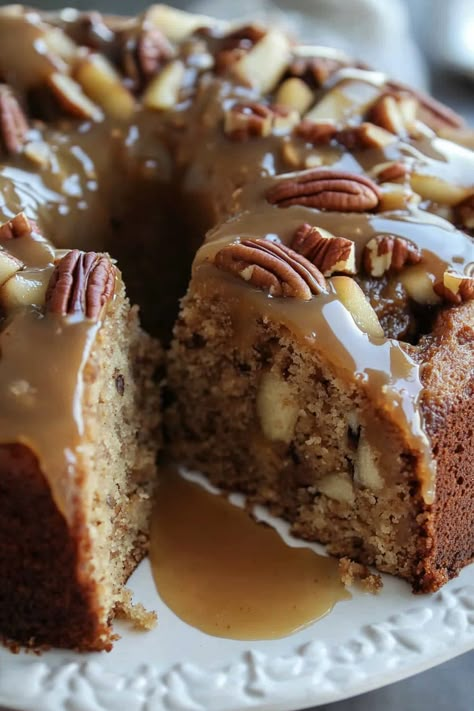 This Apple Pecan Cake with Caramel Glaze is an irresistible dessert filled with tender apple chunks, crunchy pecans, and warm spices, all brought together by a luscious homemade caramel sauce drizzled over the top. It’s a perfect combination of flavors in every bite! I can never get enough of apple cake – the soft, sweet Caramel Glaze Recipe, Apple Pecan Cake, Buckeye Cookies, Cake With Caramel, Savory Recipe, Caramel Glaze, Homemade Caramel Sauce, Pecan Cake, Irresistible Desserts