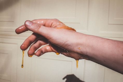 Honey hand photography  #photography #sticky #hand Hand Squeezing Fruit, Hand Drip Pics, Sticky Photography, Sticky Aesthetic, Melbourne Photoshoot, Summer Manifestations, Photography Gcse, Honey Dripping, Sketch Board