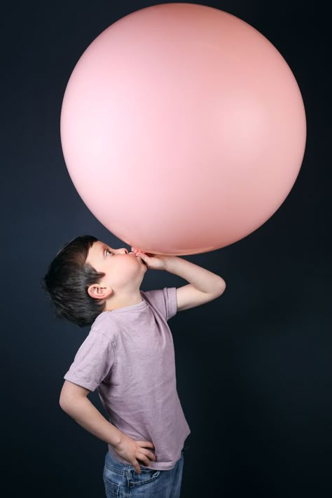 Kid blowing giant balloon Balloon Photography, Balloon Face, Balloon Photo, Giant Balloon, Balloons Photography, Blowing Up Balloons, Balloon Pictures, Kids Studio, Green Balloon