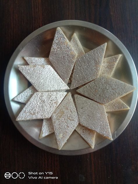 Kaju katli is a famous sweet in India. It made of cashew , sugar, cardmom powder. Its a very famous sweet . Its available in india in every sweet shop . people love it very much .I made this recipe at my home . so, if you want to see this recipe visit to my blog Kaju Katli Recipe, Sweet Shop, Pretty Food, Cashew, My Home, My Blog, Love It, Decorative Bowls, Bowl