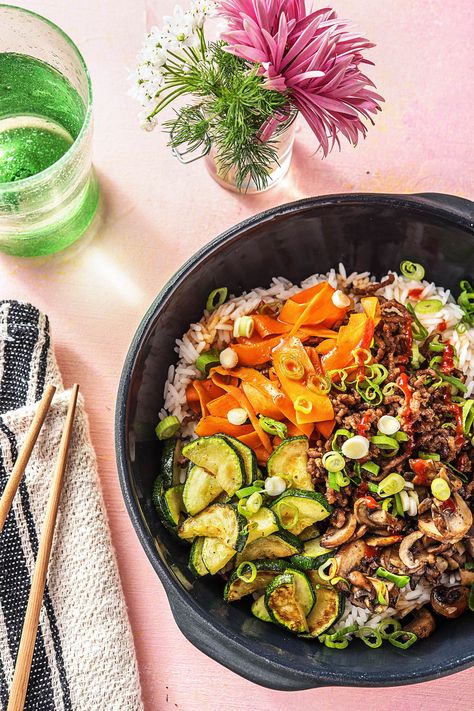 Korean Beef Bibimbap with Zucchini, Mushrooms, and Carrots | More easy beef and rice bowl recipes on www.hellofresh.com Hello Fresh Korean Beef Bibimbap, Korean Beef Bibimbap, Beef Bibimbap, Korean Style Beef, Zucchini Mushrooms, Bibimbap Recipe, Burger Bites, Hello Fresh Recipes, Rice Bowls Recipes