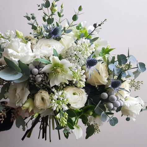 Are you planning a winter wedding? We have gathered a selection of seriously stunning floral ideas that will suit your winter wedding perfectly! Wedding Color Schemes Winter, Thistle Bouquet, Rustic Winter Wedding, Winter Wedding Bouquet, Winter Bouquet, Wedding Themes Winter, Wedding Table Flowers, Winter Wonderland Wedding, Wedding Flower Inspiration