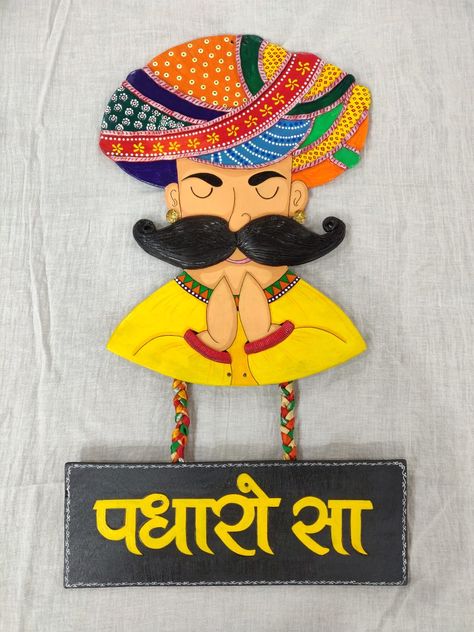 Acrylic colours, Padharo Sa, air dry clay, wall hanging, home decor Card Board Wall Hanging, Hanging Quotes On Wall, Rajasthani Clay Art, Padharo Sa Rangoli, Padharosa Painting, Padharo Sa Decor, Cardboard Hanging Decor, Wall Hanging Diy Cardboard, Wall Hanging Crafts With Cardboard