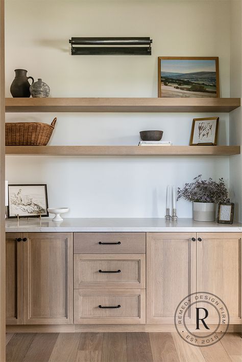 Did you know the built-ins here are actually meant to function as beverage station? We designed this nook outside the primary suite for late-night drinks or snacks. The mini fridge is panel-ready and helps conceal the beverage station. Mini Fridge And Snack Bar, Built In With Mini Fridge, Panel Ready Beverage Fridge, Built In Beverage Bar, Office Beverage Station Ideas, Mini Fridge Built In Cabinet, Mini Fridge In Island, Drink Station Home Beverage Center, Dry Bar Living Room