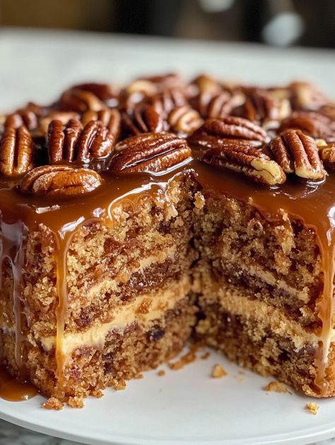 I just have to say, this Caramel Pecan Cake is pure bliss in every bite. Whether you’re here because you’re a dessert lover or because you’re in search of the perfect cake to impress guests (or just spoil yourself!), you’re in the right place. This cake is a beautiful balance of sweet caramel, crunchy pecans,... Vegan Pecan Cake, Georgia Pecan Cake, Homemade Butter Pecan Cake, Maple Pecan Cake, Caramel Pecan Cake Recipe, Pecan Caramel Cake, Caramel Pecan Cake, Chocolate Pecan Cake, Cake With Pecans