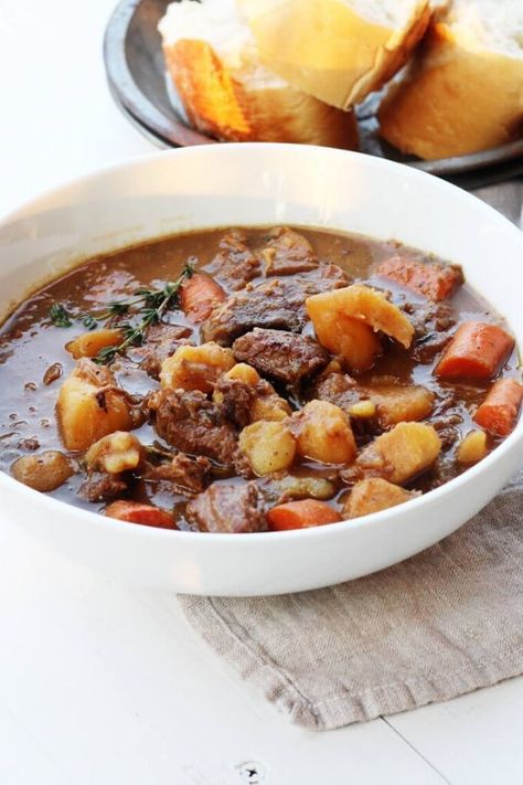 Learn how to make a traditonal style Irish Beef Stew from scratch with our easy to follow recipe.    #Irishrecipe #Irishstew #beefstew #StPatricksDay Irish Lamb Stew, Carrots And Parsnips, Lamb Stew Recipes, Irish Beef Stew, Irish Dishes, Entertaining Food, Carrots Potatoes, Irish Stew, Lamb Stew