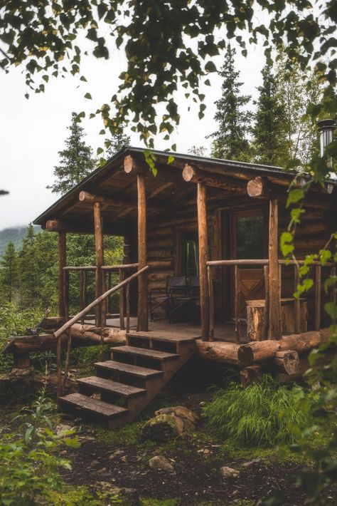 Alaska log cabin in woods with front steps leading to porch. Little Cabin In The Woods, Cabin Aesthetic, Caravan Renovation, Forest Cabin, Cabin Exterior, Wooden Cabins, Cottage Cabin, Cabin Living, Little Cabin