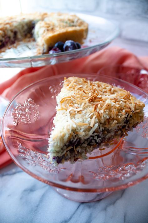 One slice of coconut blueberry coffeecake on pink depression glass plate Blueberry Coffeecake, Coconut Blueberry, Food Spread, Toast In The Oven, Easter Food, Quick Breads, Frozen Blueberries, Round Cake Pans, Family Favorite Meals