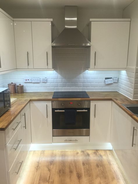 B&Q small kitchen, white, gloss, wooden, subway tiles Kitchen White Gloss Cabinets, Kitchen Ideas White Tiles, Small Kitchen Ideas Square, Small White Gloss Kitchen Ideas, Small Kitchen Wooden Floor, White Kitchen With Tiles, Small Fitted Kitchen Ideas, B&q Kitchen, Small Flat Kitchen Ideas