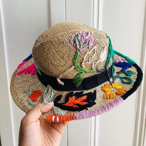 Embroidering and repurposing a used straw hat for this summer’s sun ☀️ 🎩 . . #upcycle #repurposing #earthday #zerowaste #colorblock… Whimsical Handmade Brimmed Sun Hat, Embroidery On Straw Hat, Handmade Vintage Sun Hat For Festival, Embroidered Straw Hat, Multicolor Embroidered Summer Hat, Embroidery Darning, Adjustable Hand-painted Sun Hat For Summer, Weaving Embroidery, Hat Decor