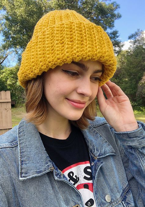 This hand-crochet yellow/mustard ribbed beanie is the perfect unisex beanie that is both fashionable and very cozy! The acrylic yarn is very soft and stretchy, so it will never be too tight and easily fits over glasses. I am also now offering a small and large size! For reference in the pictures, my head is about 21 inches around. Beanie in pictures is a Large Small: 10.5in tall (26cm), 8in wide (20cm), 3oz (85g) Large: 11.5in tall (29cm), 10in wide (25.5cm), 3.5oz (90g) - Handmade from 100% acr Mustard Beanie Outfit, Crochet Ribbed Beanie, Minions Halloween, Minion Halloween, Crochet Yellow, Yellow Beanie, Yellow Knit, Yellow Mustard, Skull Cap Beanie