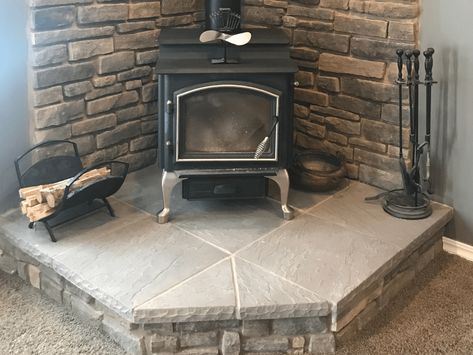 Hearth Pad Corner, Wood Stove Platform Ideas, Stone Hearth Wood Stove, Wood Stove Surround Corner Stone Walls, Farmhouse Wood Stove Hearth, Wood Burner Hearth Ideas, Wood Stove Tile Surround, Hearth Stone Ideas, Diy Wood Stove Hearth