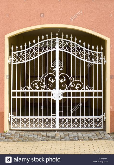 Download this stock image: Old beautiful gates of wrought metal. - CPD3KY from Alamy's library of millions of high resolution stock photos, illustrations and vectors. Circle Gate Design, Custom Iron Gates, Wrought Iron Gate Designs, Beautiful Gates, Modern Main Gate Designs, Gate Images, Cast Iron Gates, Old Gates, Exterior Door Designs