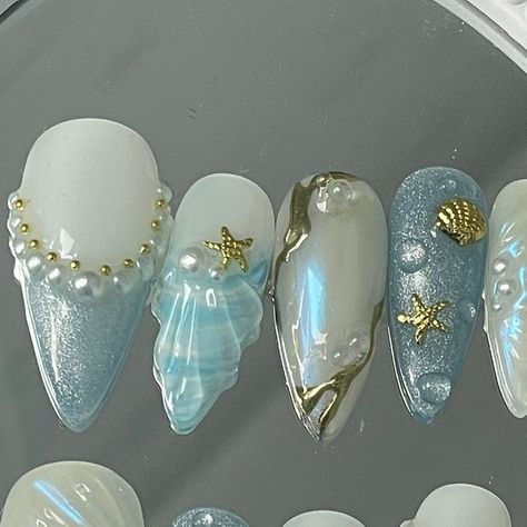 Press On Nails Australia | Custom Made To Order on Instagram: "It’s a beach day somewhere // OCEAN FANTASY SET 🌊☀️ Adore how refreshing this set is (Pictured Long Stiletto)   • •  #presson #pressonnails #naildesign #nailart #nailinspo #nailinspiration #nailtech #pressonnailbusiness #pressonsets #nailartist #nailsaustralia #stickonnails  #customnails #custompressonnails #miffynails #y2k #prettynails #cutenails #kessiistudio #customnails #custompresson #naildesigns #y2krings #sanrionails #coquettenails #bownails#3Djellygel #australiapressons #australianails #seashellnails #oceannails" Nails Ocean Design, Ocean Nails Designs, Seahorse Nails, Mermaidcore Nails, Sea Inspired Nails, Nails Australia, Ocean Nails, Seashell Nails, Cruise Nails