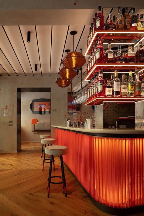 Industrial Sports Bar, Mid Century Modern Restaurant, Restaurant Interior Design Modern, Orange Restaurant, Italian Aperitivo, Orange Cafe, Exposed Wood Ceilings, Orange Bar, Red Restaurant