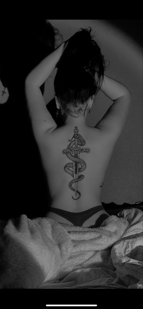 Snake Tattoo On Women, Cool Tattoos Snake, Snake Tattoos Backbone, Spine Tattoos For Women Unique Snake, Tattoo Back Snake, Tattoo Ideas Snake Back, Spine Tattoo Inspo Women, Womens Snake Tattoo Back, Knife Spine Tattoos For Women