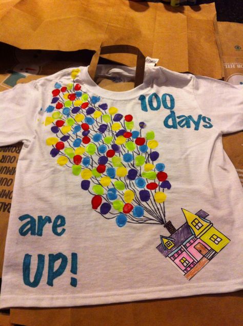 100 days t-shirt UP balloons. Eric used his thumb dipped in 5 different paint colors. The paint was fabric paint. For the lettering we used a stencil and Sharpie. On the back we stenciled "Adventure is Out There!" 100ty Day Of School Shirt, 100 Day Shirt Ideas, 100days Of School Shirt, 100 Días De Clases, 100th Day Of School Crafts, 100 Day Of School Project, 100 Days Of School Shirt, Adventure Is Out There, Classroom Freebies