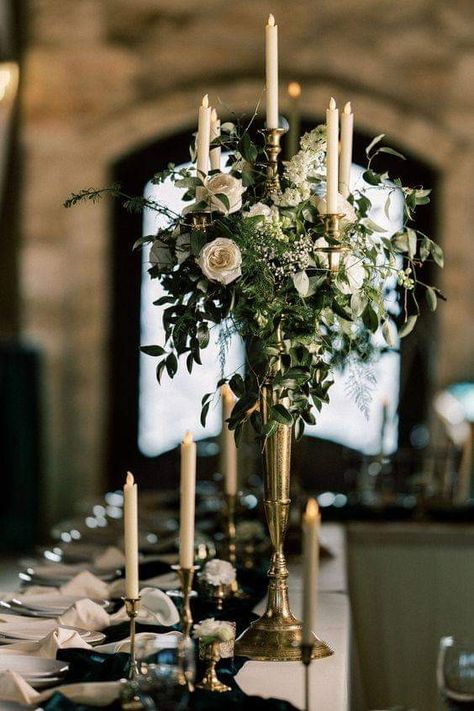 Table setting ideas with lighting Tall Gold Vases Centerpiece Wedding, Tall And Short Candle Centerpieces, Victorian Flower Arrangements, Candelabra Wedding Ceremony, White Wedding Tablescape, Candlestick Centerpiece Wedding, Victorian Wedding Themes, Candelabra Flowers, Candelabra Wedding Centerpieces