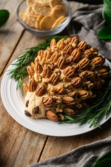 Woodland hedgehog cheese ball is a simple, savory appetizer that will be a stunning centerpiece at a woodland baby shower or first birthday.  Cream cheese, cheddar, Worcestershire sauce, and spices make this vegetarian snack idea a super cute, gender neutral munchie. Hedgehog Cheese Ball, Bridal Shower Snacks, Baby Shower Snacks Boy, Shower Snacks, Woodland Hedgehog, Boys Food, Baby Shower Snacks, Ideas For Baby Shower, Food Vegetarian