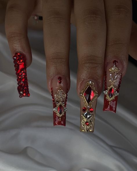 Nails For Quinceanera Red, Red Nail Designs For Quince, Red And White Nails With Rhinestones, Red Quince Nails Almond, Red And Gold Prom Makeup, Red And Gold Prom, Red Nails Ideas Quince, Red And Gold Bling Nails, Acrylic Nails Xmas