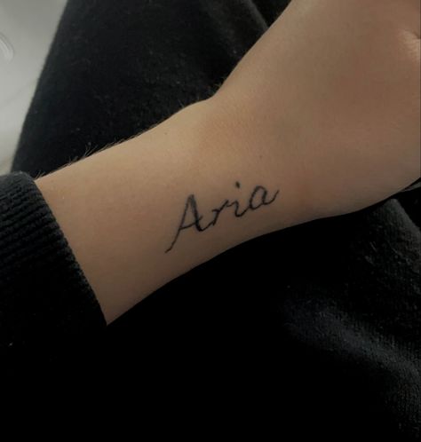 aria tattoo simple name hand aesthetic Aria Name Tattoo, Aria Tattoo Ideas, Aria Tattoo Name, Aria Tattoo, Aria Name, Name Tattoo, Name Tattoos, Elegant Dresses Long, Tattoos