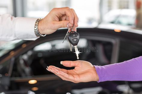 Car salesman handing over car keys in dealership. Handover of car keys in a deal #Sponsored , #Paid, #AD, #salesman, #car, #Handover, #handing Buying New Car, Car Salesman, Buy Used Cars, Minivan, European Cars, Car Loans, Rent A Car, Car Dealership, Car Keys