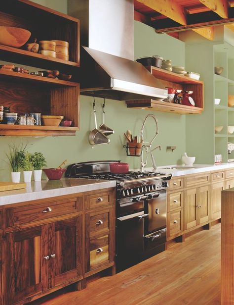 Lively yet grounded, enticing yet soothing, PPG's 2022 Color of the Year, Olive Sprig, works well with natural materials like bamboo flooring or wooden cabinets. Photo courtesy of PPG.