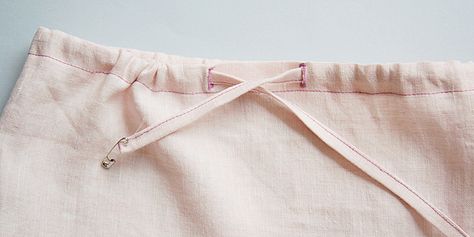 Sewing Glossary: How To Add A Drawstring To A Waistband Tutorial Waistband Tutorial, Skirt Ideas, Sewing Machine Reviews, Sewing Essentials, Drawstring Neckline, Seam Ripper, Flannel Pajamas, Sewing Tips, How To Sew