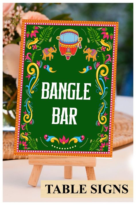 This beautiful Bangle station sign or Indian wedding decor sign with mandala, from our Ethnic Fusion collection, lovingly created by us, is for those who would like to leave, not only a subtle, but also an impactful impression on their guests!

Bangle station signs Bindi Bar signs, Bindi station sign Bangle bar sign Mehndi decoration, Mehndi decor as Haldi decor & Food station sign Food Station Signs, Mehndi Function Decoration, Henna Station, Mehndi Decoration Ideas, Mehendi Decoration, Mehndi Decoration, Indian Diy, Indian Mehendi, Bangle Bar