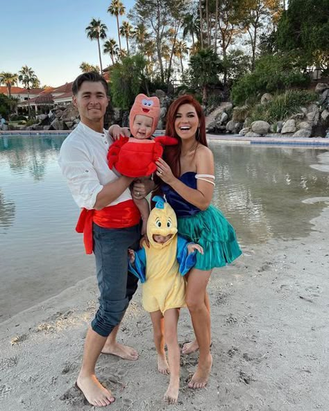 50 Adorable Family Halloween Costumes Halloween Costumes 3 Family, Ariel Flounder Sebastian Costumes, Family Costume Ideas For 3 Disney, Baby Ariel Costume, Pop Culture Family Halloween Costumes, Ariel Prince Eric Costume, Little Mermaid And Prince Eric Costume, Ariel And Sebastian Costume, Family Little Mermaid Halloween Costumes