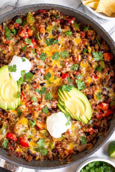 Cheesy Beef Taco Skillet (30-Minutes) - Eat the Gains Healthy Taco Skillet, Low Carb Taco Skillet, Ground Beef Taco Bowls, Sweet And Spicy Stir Fry, Taco Skillet Dinner, Cheesy Taco Skillet, Turkey Taco Skillet, Beef Taco Skillet, Taco Skillet Recipe