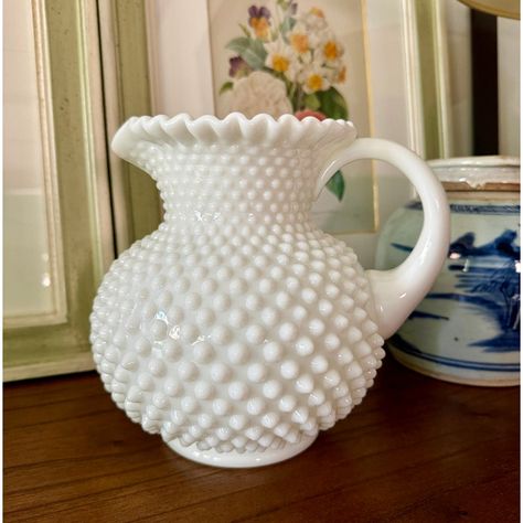 A sweet vintage milk glass hobnail pitcher by Fenton. Scallop/ruffle detail at rim and solid handle. In excellent condition. Milk Glass Hobnail Lamp, Hobnob Milk Vases, Dishes Ideas, Milk Glass Decor, Brass Pitcher, Fenton Milk Glass Cake Stand, Fenton Milk Glass Hobnail, Milk Glass Collection, Sage Green Bedroom