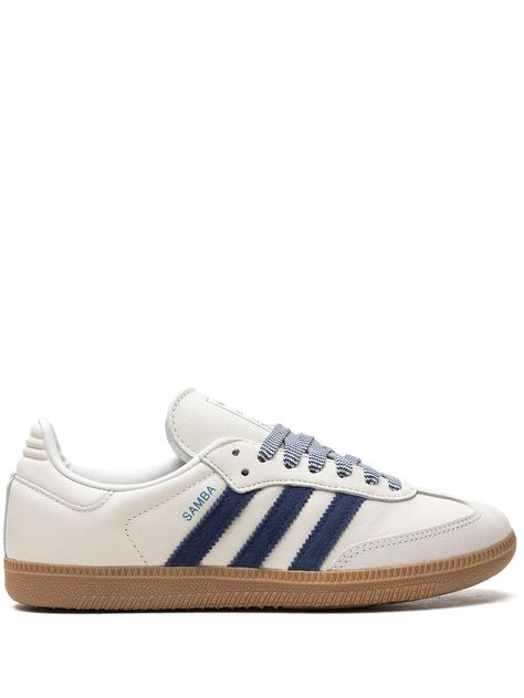 "Find ADIDAS Samba Og \"\"off Dark Blue\"\" Sneakers on Editorialist. off-white blue leather front lace-up fastening signature 3-Stripes logo logo patch at the tongue contrasting laces round toe branded insole gum-rubber sole These styles are supplied by a premium and authenticated sneaker marketplace. Stocking only the most sought-after footwear, they source and curate some of the most hard to find sneakers from around the world." Colors That Go Good With Navy Blue, Navy Blue Sambas, Shoes Inspo 2024, Cute Sambas, Adidas Trendy Shoes, Platform Sambas, Shoes For Italy, Fall Outfits Shoes, Colorful Sneakers Outfit