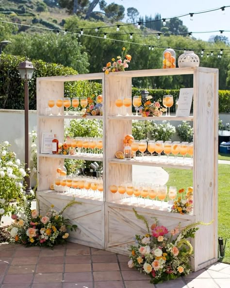 aperol spritz wedding cocktail installation Aperol Spritz Welcome Drink, Aperol Station Wedding, Wedding Aperol Spritz Bar, Aperol Spritz Seating Chart, Aperol Spritz Wedding Cocktail, Aperol Spritz Wedding Theme, Aperol Spritz Station Wedding, Wedding Aperol Spritz, Aperol Spritz Tower