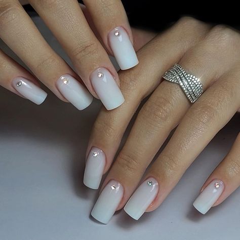 21 Stunning Milky White Nails Ideas: Designs with Glitter, French Tips, Gold, and Rhinestones Milky White Nails With Rhinestones, Creamy White Nails, French Tips Gold, Nails Sophisticated, White Nails Ideas, Trendy Nail Colors, Ballerina Nails Short, Milky White Nails, Opi Polish