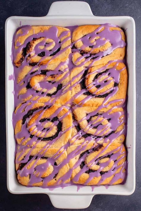 These Ube Cinnamon Rolls are filled with a sweet ube filling, baked until light and fluffy, then drizzled with an ube cream cheese frosting. Perfect for an indulgent holiday breakfast or sweet Filipino dessert. #ube #ubebread #filipinobread #ubecinnamonrolls #filipinocinnamonrolls #veganfilipino #sweetsimplevegan #vegan Ube Cream Cheese, Okinawan Sweet Potato, Ube Recipes, Filipino Dessert, Cinnamon Roll Dough, Filipino Desserts, Vegan Cream Cheese, Holiday Breakfast, Vegan Condiments