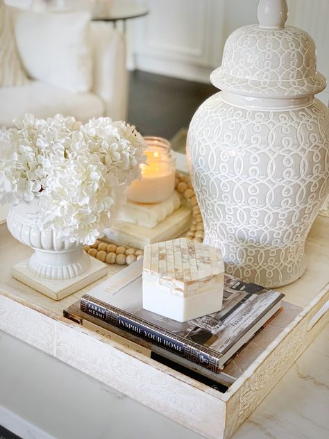 Monochromatic decor with different textures will always have my heart. Ginger jar. Coffee table styling. How to style a coffee table. Marble coffee table. Ginger Jars Decor Living Rooms, Coffee Table For Small Living Room, Ginger Jars Decor, Creative Office Design, Shades Of Cream, Monochromatic Decor, White Ginger Jars, Table Marble, Tray Styling