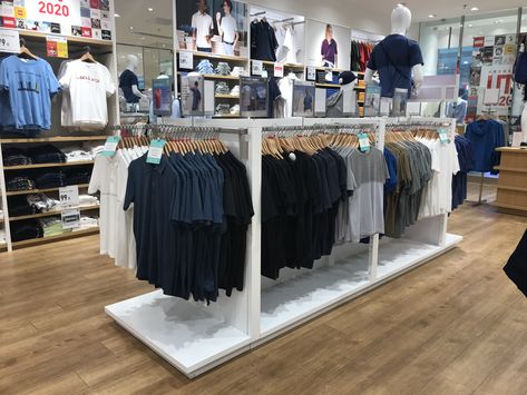 Uniqlo clothing display stand Mens Clothing Shop Interior, Garments Shop Interior Display, Display Clothes, Uniqlo Store, Clothes Shelves, Shop Shelving, Clothing Store Displays, Clothing Display, Retail Store Interior Design