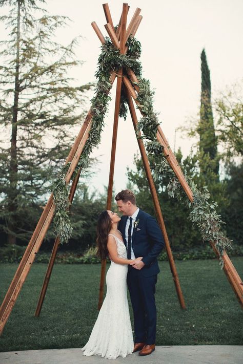 Wood Wedding Teepee |  Arch Greenery | Park Winters Wedding | Fall Wedding Ideas #greeneryweddingarch #arch #teepee Teepee Wedding Ideas, Wood Teepee, The Grove Byron Bay, Wedding Teepee, Arch Greenery, Winter Wedding Arch, Ladder Wedding, Teepee Wedding, Wild Rabbits