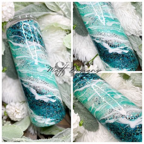 "--ITEM DESCRIPTION-- This listing is for one (1) stainless steel insulated teal and white marble glitter tumbler in the design featured above. You may choose the size of the tumbler using the drop down menu upon checkout. The size shown in the photos is a 20 oz. skinny tumbler. --PERSONALIZATION-- We can add a name to the tumbler if requested. The name will be featured in white with a shiny blue outline going up the length of the tumbler (vertically). Please use the font chart to choose the fon Teal Glitter Tumbler, Teal Epoxy Tumbler, Blue Epoxy Tumbler, Cup Designs Tumbler, Glitter Cups Tumblers, Epoxy Tumbler Designs, Popular Tumbler Designs, Epoxy Tumbler Ideas, Milky Way Tumbler