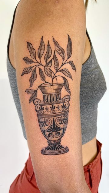 Greek Woman Tattoo Design, Lower Knee Tattoos Women, Plant Vase Drawing, Vase With Leaves Tattoo, Vase Flash Tattoo, Fine Line Flower Vase Tattoo, Vase Design Tattoo, Ceramic Vase Tattoo, Vase Tattoo Ideas