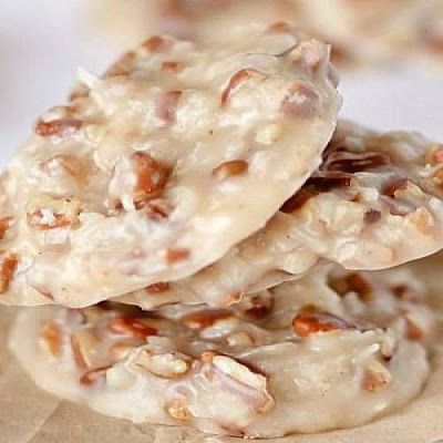 Pecan Coconut Praline Cookies (No Bake) @keyingredient *#nobake2½	cups sugar ½	cup evaporated milk ½	cup corn syrup ½	cup butter 1	teaspoon vanilla 2-2½	cups chopped pecans 2½	cups grated coconut Praline Cookies Recipe, Pecan Praline Cookies, Praline Cookies, Pecan Praline, Louisiana Cajun, Cajun Cooking, Coconut Pecan, Pecan Pralines, Coconut Cookies