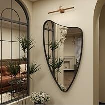 Irregular Mirror Bedroom, Funky Wall Mirror, Entryway Mirror Inspiration, Mirrors Above Fireplace Mantle, Mirrors Behind Sofa, Black Wall Entryway, Dining Room Decor Mirror, Tall Mirror Decor, Entry Way Mirror Ideas