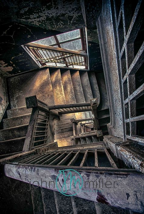 "FINE ART PRINTS BY JOHN J MILLER PHOTOGRAPHY \"Chasing Your Tail\" A Fine Art Print from an abandoned high rise office building. To see more from my abandoned gallery, please click here: http://etsy.me/1KLvJNZ This Fine Art Print will look great on your wall in the home or Office. Great for Gifts! MULTIPLE SIZES and PRICING: See dropdown menu on \"select a size\" just above the \"add to cart\" for the different sizes and prices offered. Other sizes and Options are available upon request, just email me!  *Some slight cropping may occur with different sizes.  TO PURCHASE: Select a size and price from the select a size drop down menu, add to your shopping cart and then check out using either Etsy direct checkout or PayPal. NOTE: Above preview image is low resolution. Printed Images with be o Stairwell Wall Decor, High Rise Office, Stairwell Wall, Growth And Decay, Abandoned Castles, A Level Art, Abandoned Buildings, Abandoned Places, Eiffel Tower Inside