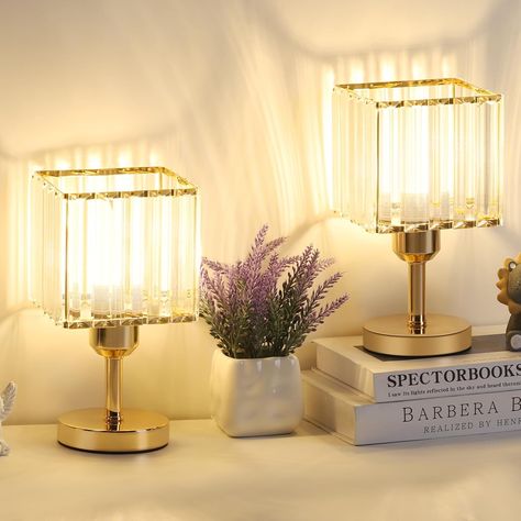 About this item 【Decorative Crystal Lamps】Uniquely designed sparkling crystal table lamps that give off a beautiful soft light and sparkle throughout the room. Dual gold bedside lamps are a perfect decoration for children's rooms, guest rooms, bedrooms, nightstands or living rooms. 【Dual Table Lamps for Bedside】The 1.7-meter-long power cord can place the table lamps gold set of 2 anywhere far or near the bed, and there is no need to fumble for the switch on the base of the nightstand light with crystal shade in the dark, because the switch of this bedside lamp is on the power cord, and you can place it at the bedside within reach. Crystal Bedroom, Small Desk Lamp, Touch Table Lamps, Bedroom Bedside Lamp, Crystal Table, Gold Lamp, Crystal Table Lamps, Nightstand Lamp, Iron Lighting